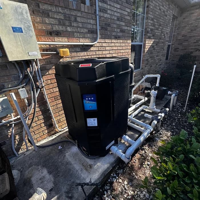 GulfStream pool heat pump installed beside pool equipment in Florida